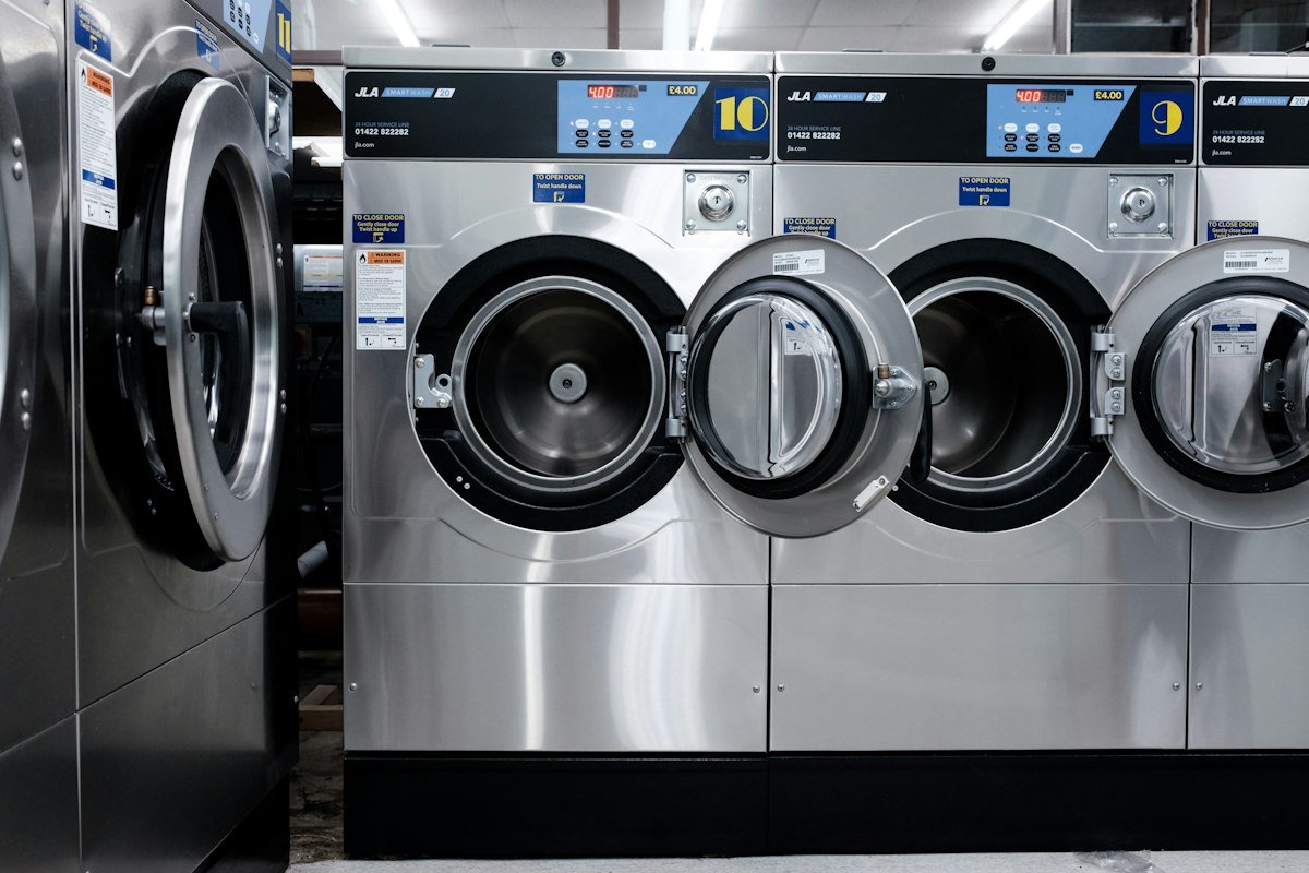 Row of commercial washing machines